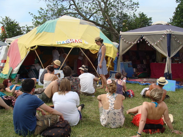 The main fundraising activity, however, is the performance of holistic healing therapies, which has crowds gathering outside the tent.